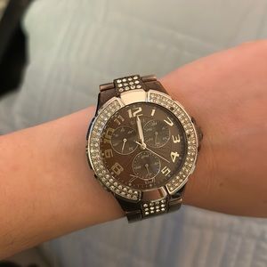 Brown guess watch.